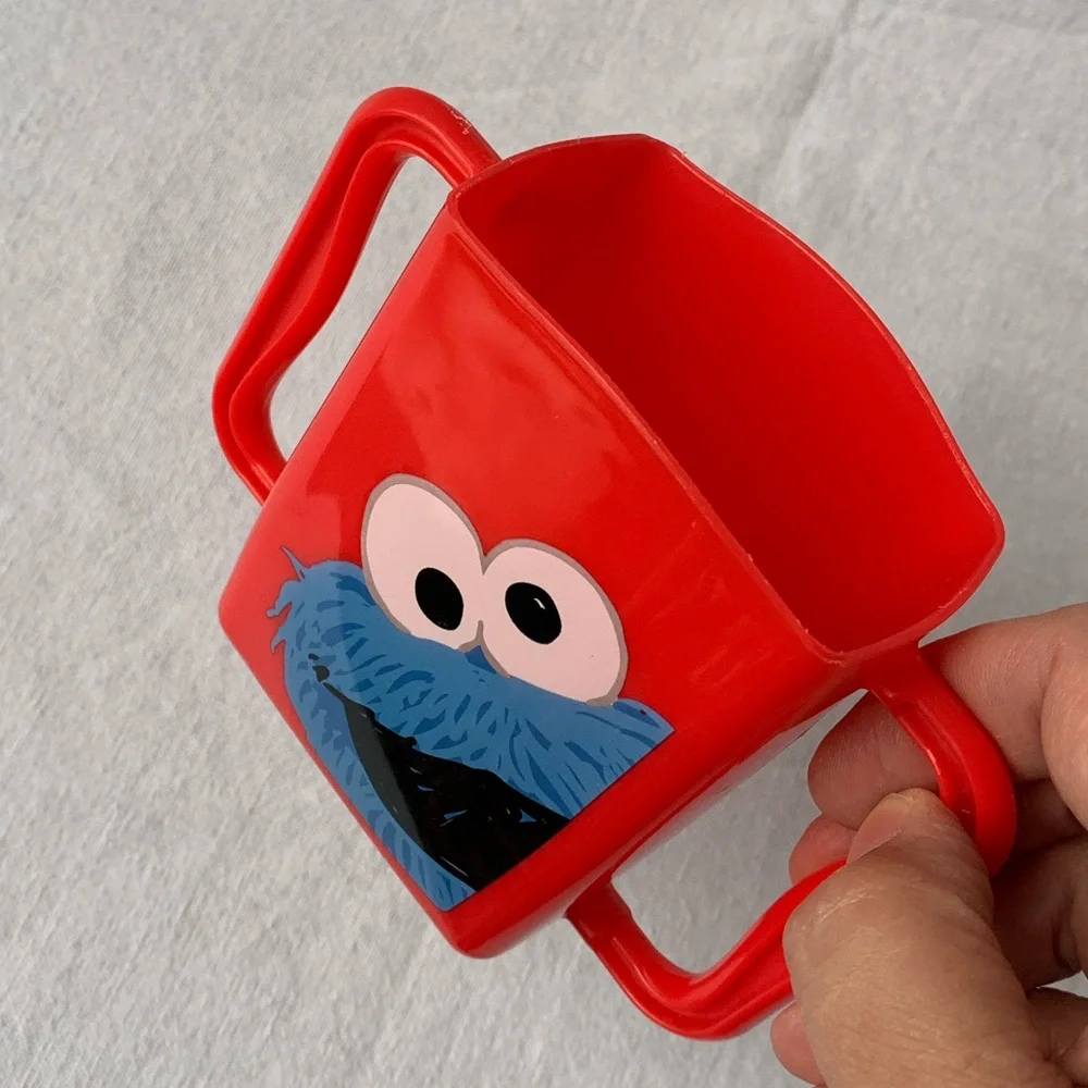 2013 Sesame Street Cookie Monster Kids Red Plastic Juice Box Holder with Handles